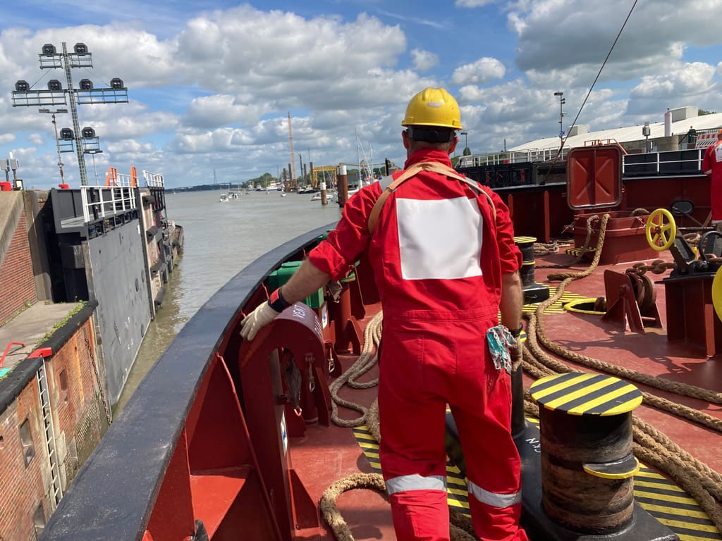 Seafearer standing on a vessel